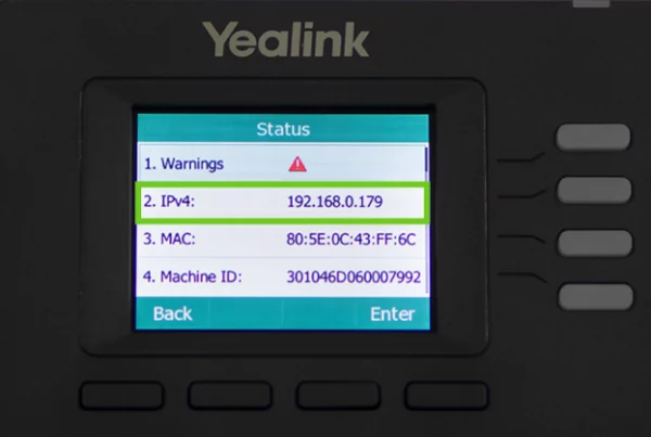 A close-up of a Yealink IP phone screen displaying the network status menu. The screen shows details such as warnings, an IPv4 address (192.168.0.179) highlighted in green, a MAC address, and a machine ID. The interface includes "Back" and "Enter" options at the bottom.