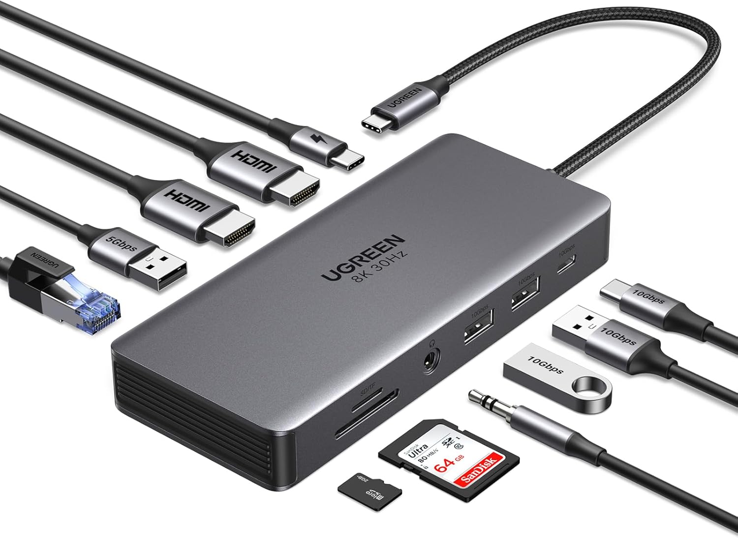 A Ugreen Revodok Pro 313 USB-C hub with various cables and adapters connected or shown alongside it, including HDMI, USB-A, Ethernet, an audio jack, and an SD card.