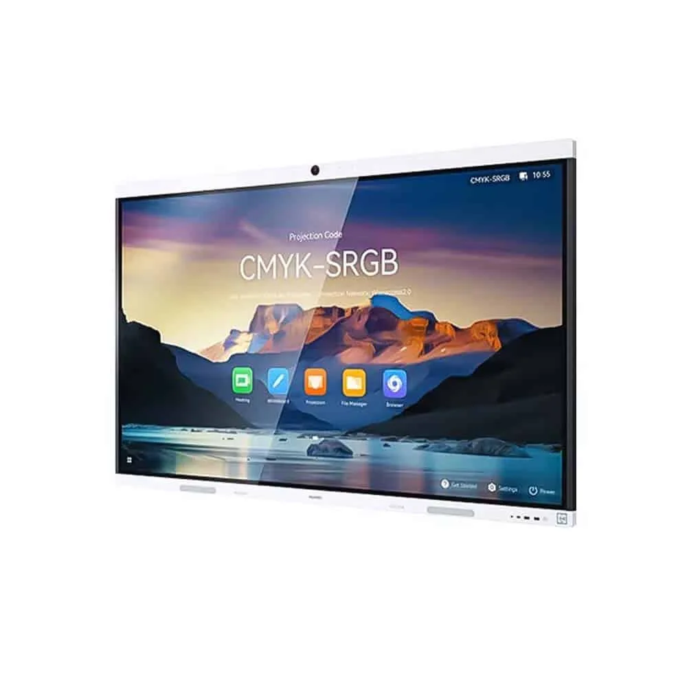 A three-quarter view of a large, white interactive display screen with a wide white bezel. The screen is angled slightly to the right, showing the right side and front of the display. The screen displays a vibrant landscape image with the text "CMYK-SRGB" prominently featured. Below the text, several application icons are visible, including a green document icon, a blue brush icon, and an orange folder icon. A small camera is centered at the top of the display's bezel.