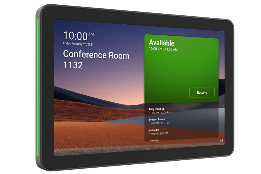 A Logitech Tap Scheduler device for a meeting room. The screen shows the time as 10:00 AM and identifies the room as "Conference Room 1132". A large green box indicates the room is "Available" from 10:00 AM to 11:00 AM with a "Reserve" button. The schedule for the rest of the day is listed below. The device has a green light on the left side, signaling availability.