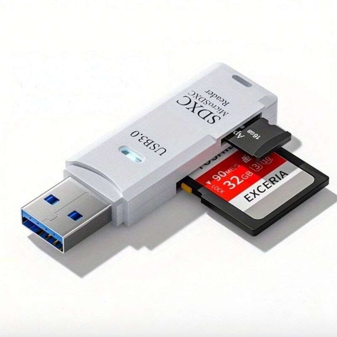 A white Exceria USB 3.0 SDXC card reader with an SD card labeled "Exceria 32GB" and a smaller microSD card labeled "ADATA 16GB" inserted into its slots.