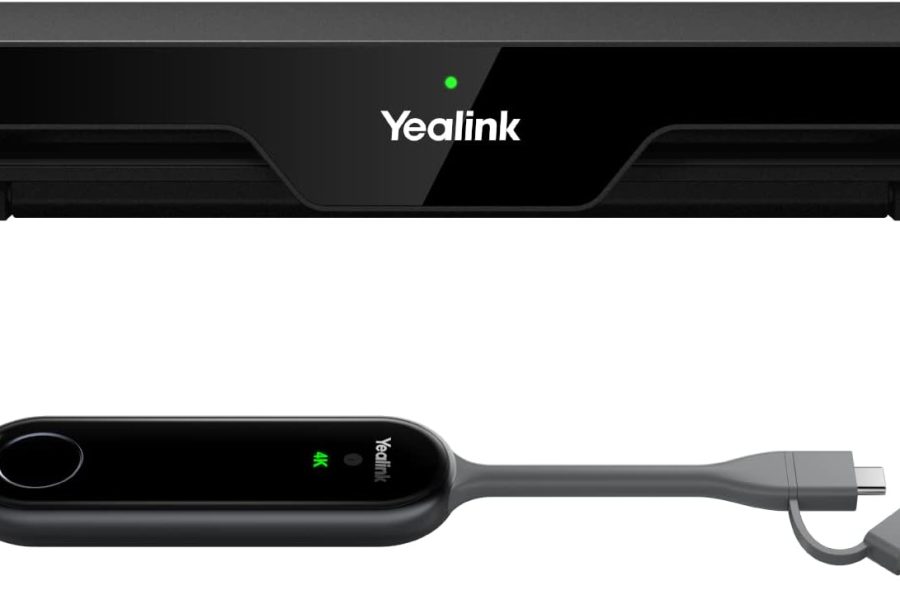 A close-up of a Yealink wireless presentation system, featuring a rectangular black hub with "Yealink" printed in white on the front and a green LED light above it, and a sleek, black, oval-shaped dongle below it. The dongle, also labeled "Yealink 4K", has a glowing green ring around a circular button on its left, a green LED light in the center, and a grey cable extending to the right, splitting into a USB-C and a USB-A connector.