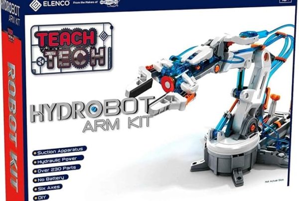 A slightly angled shot of the retail box for the "Hydrobot Arm Kit." The box is predominantly white with a dark blue top and sides, and red text running vertically on the left side that says "ROBOT KIT." The front of the box features a large image of the assembled white and gray robotic arm with orange and translucent blue accents. Above the arm, in a stylized red and white graphic, it says "TEACH TECH," and below the arm, in large gray letters, is "HYDROBOT ARM KIT." A bulleted list of features is on the bottom left: "Suction Apparatus," "Hydraulic Power," "Over 230 Parts," "No Battery," "Six Axes," and "DIY." The top right corner indicates "AGE 10+" and "ELENCO From the Makers of SNAP CIRCUITS®."