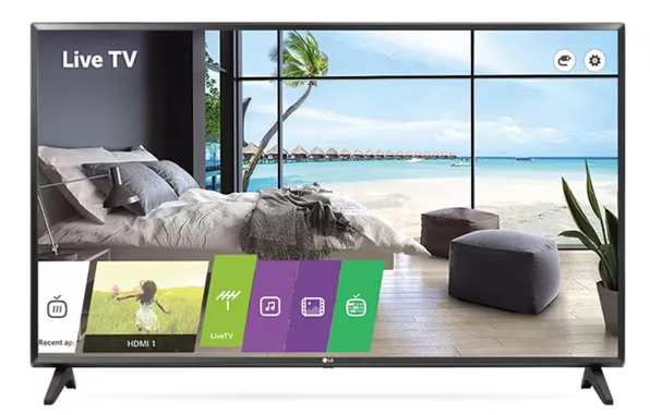 A black LG flat-screen television is displayed head-on against a white background, its screen showing a composite image. The right two-thirds of the screen shows a tropical view of overwater bungalows and clear blue water through a window-like grid. The left third shows a cozy bedroom scene with a bed and a nightstand, labeled "Live TV" at the top. Overlaid on the bottom portion of the screen are three small, colored rectangular tiles: a green tile with a "LiveTV" icon, a purple tile with a music note icon, and another purple tile with a film strip icon. A small rectangular box on the bottom left is labeled "Recent app". The "LG" logo is centered on the bottom bezel, and two black, V-shaped legs support the TV.