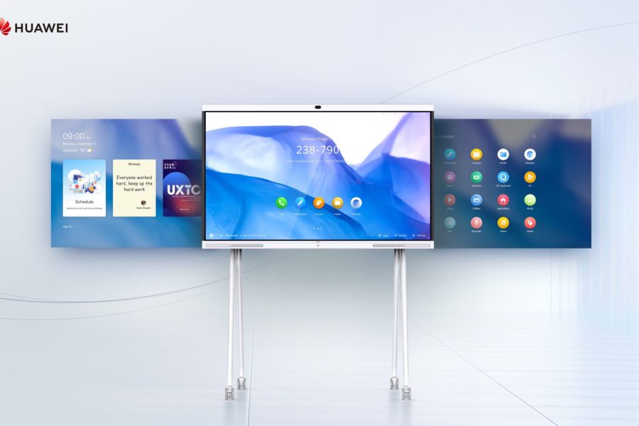 A product shot of a "HUAWEI IdeaHub" interactive display. The main screen, centrally located, shows a blue and white abstract background with a set of app icons. Flanking the main screen are two additional screens that appear to be a single unit with the main screen, with the left screen showing a calendar and widgets and the right screen displaying a grid of various app icons. The "HUAWEI" logo is in the top-left corner.