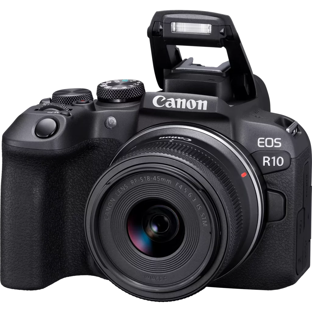 A black Canon EOS R10 mirrorless camera with an RF-S 18-45mm F4.5-6.3 IS STM lens attached. The camera's built-in flash is popped up and ready to fire.